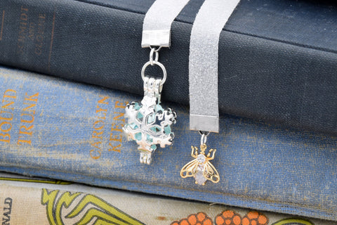 Snow Queen Princess Fairy Tale Glitter Ribbon Bookmark with Snowflake Pearl Cage Locket and Bee Charm fripparie